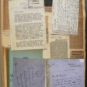 Page from a scrapbook in which newspaper articles and letters have been stuck, all relating to George Eliot.
