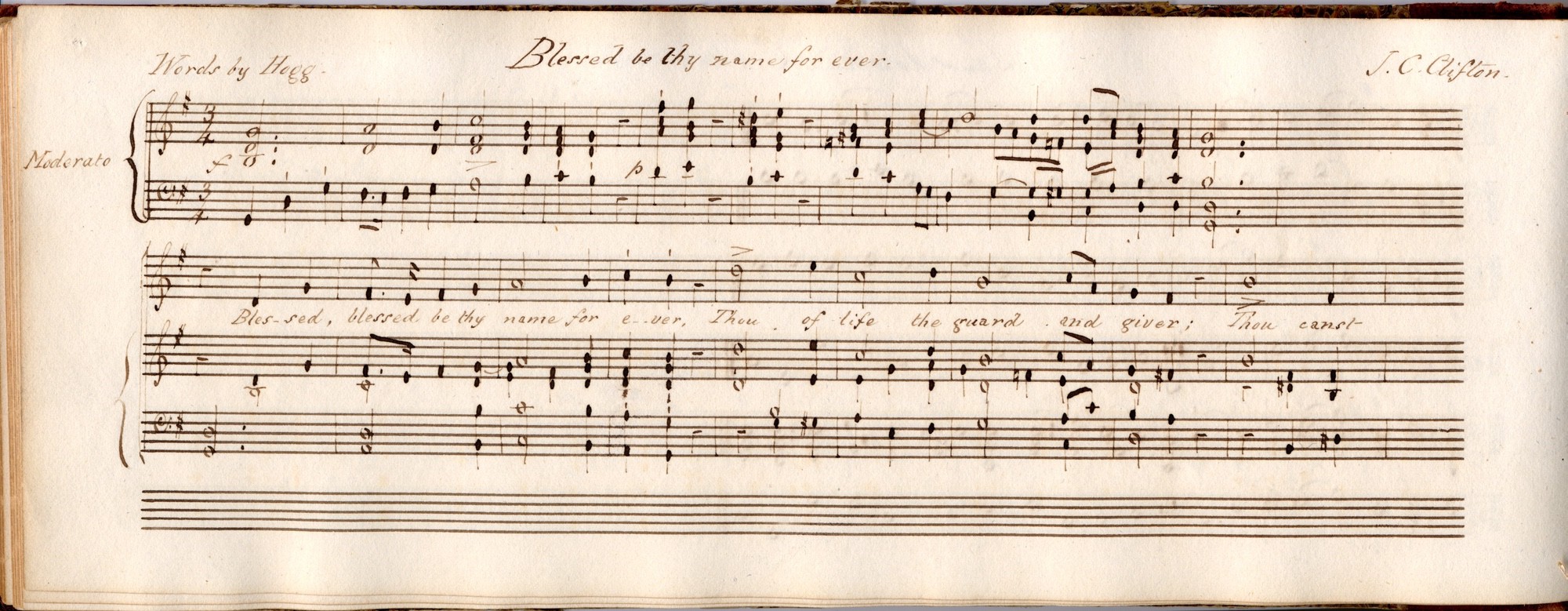 Page from a music book. There are lines across the page and musical notes written onto them.