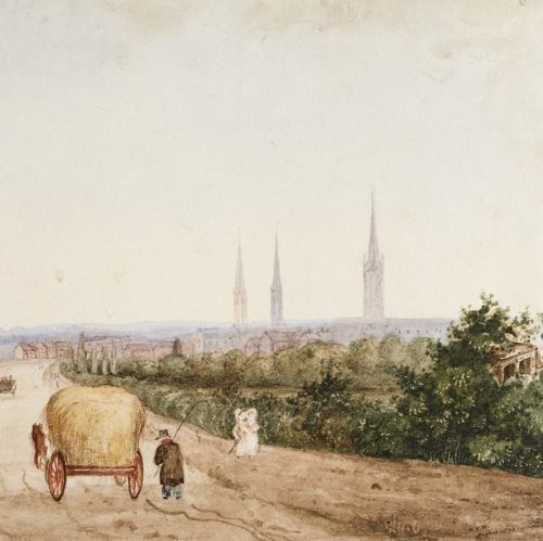 Painting showing a rough lane in the foreground. A hay filled cart and figure are on the lane. There are two women in bonnets to the right hand side and two dogs to the left hand side. The lane is surrounded by green bushes and trees. Houses can be seen ahead. In the distance are three tall spires.