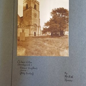 Black and white photograph of a church with the title Chilvers Coton Churchyard. Mounted on blue/grey card.