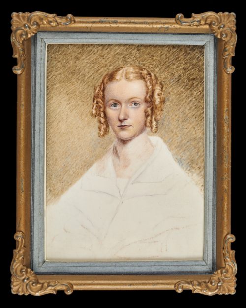 Painting of a woman with side ringlets dressed in white. In gilt brass (gilt now missing) frame.