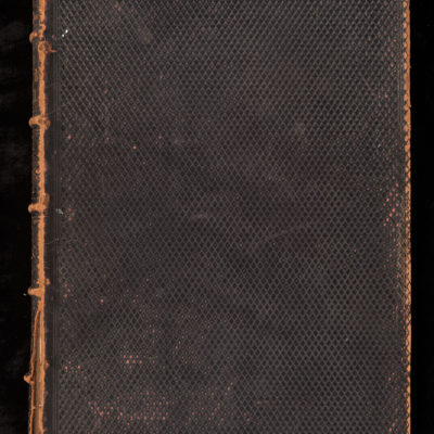 Front cover of a large book. Black with a diamond criss-cross pattern. Tan edges show signs of wear.